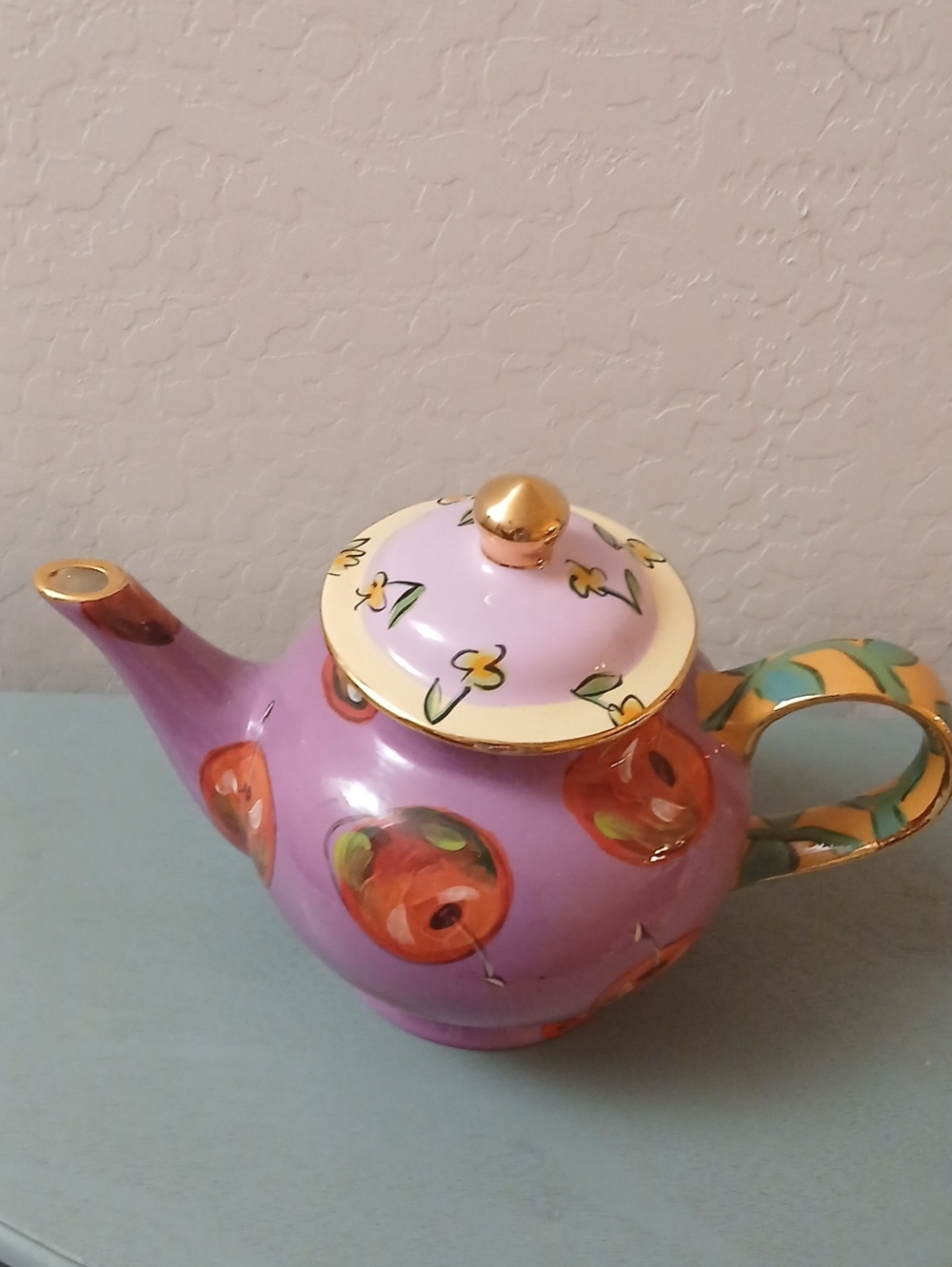 Hand-Painted Purple Ceramic Teapot with Gold Accents